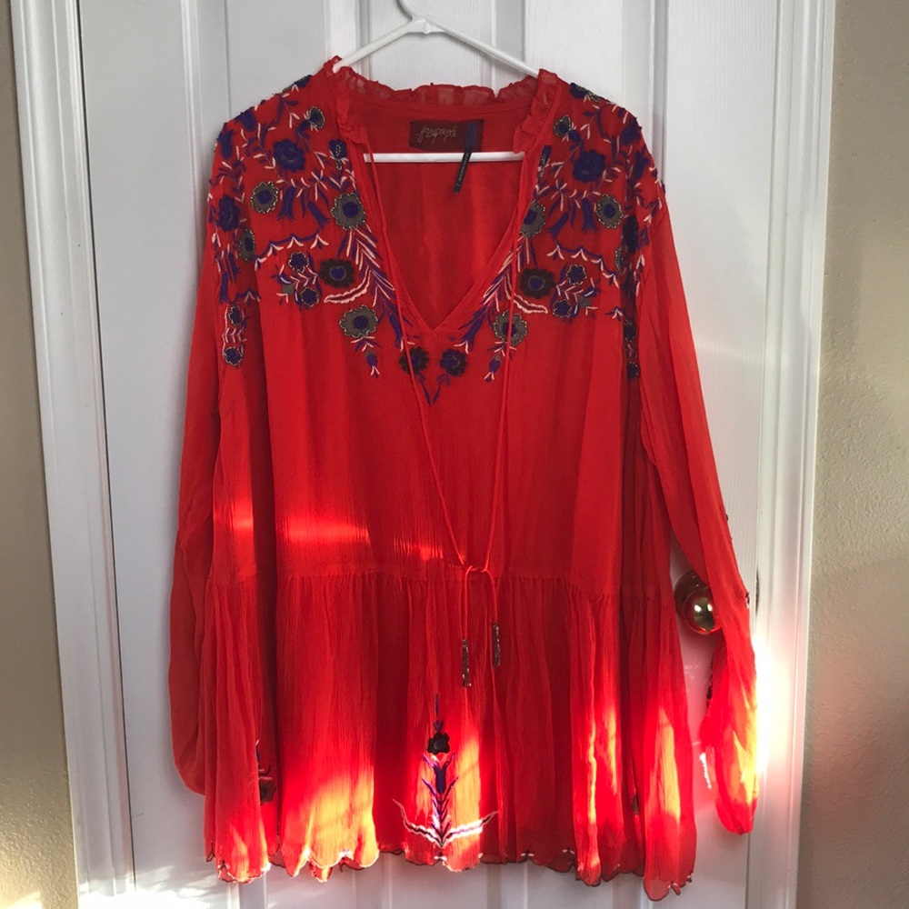 Free people red embroidered dress.